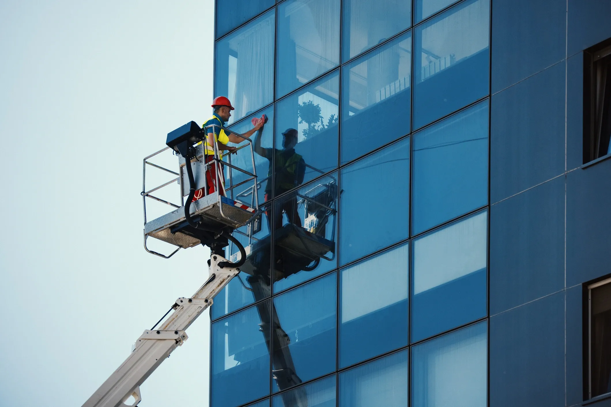 Boom lift building maintenance facade cleaning
